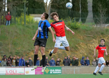 Fotos del partido entre Zarramonza y la Universidad de Navarra