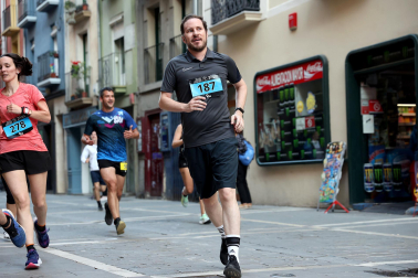 Fotos de la Tres Burgos Tres Millas celebrada este viernes en Pamplona.