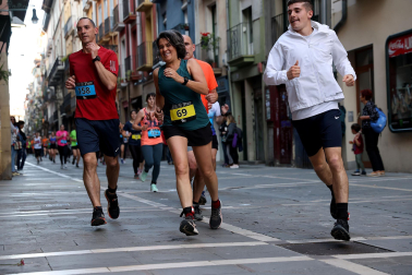 Fotos de la Tres Burgos Tres Millas celebrada este viernes en Pamplona.