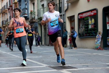 Fotos de la Tres Burgos Tres Millas celebrada este viernes en Pamplona.