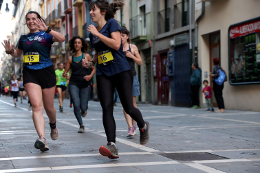 Fotos de la Tres Burgos Tres Millas celebrada este viernes en Pamplona.