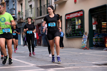 Fotos de la Tres Burgos Tres Millas celebrada este viernes en Pamplona.