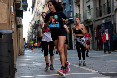 Fotos de la Tres Burgos Tres Millas celebrada este viernes en Pamplona.