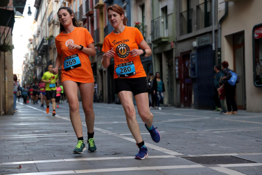Fotos de la Tres Burgos Tres Millas celebrada este viernes en Pamplona.