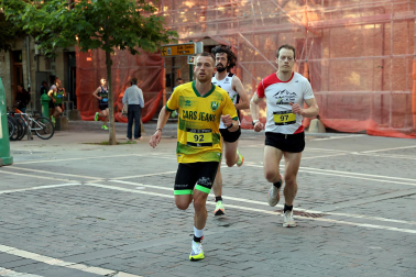 Fotos de la Tres Burgos Tres Millas celebrada este viernes en Pamplona.