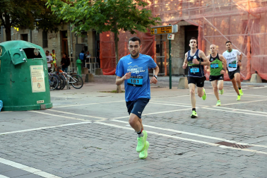 Fotos de la Tres Burgos Tres Millas celebrada este viernes en Pamplona.