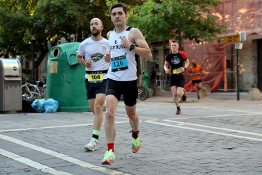 Fotos de la Tres Burgos Tres Millas celebrada este viernes en Pamplona.