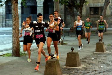 Fotos de la Tres Burgos Tres Millas celebrada este viernes en Pamplona.