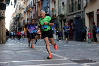 Fotos de la Tres Burgos Tres Millas celebrada este viernes en Pamplona.