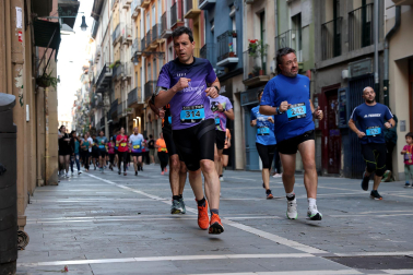 Fotos de la Tres Burgos Tres Millas celebrada este viernes en Pamplona.