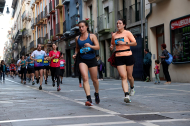 Fotos de la Tres Burgos Tres Millas celebrada este viernes en Pamplona.