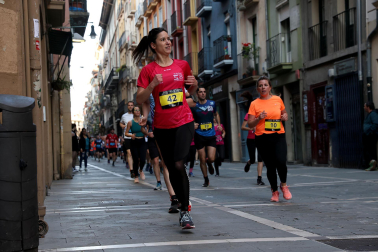 Fotos de la Tres Burgos Tres Millas celebrada este viernes en Pamplona.