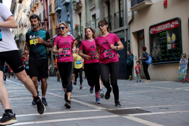 Fotos de la Tres Burgos Tres Millas celebrada este viernes en Pamplona.