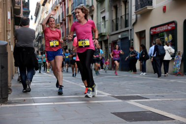 Fotos de la Tres Burgos Tres Millas celebrada este viernes en Pamplona.