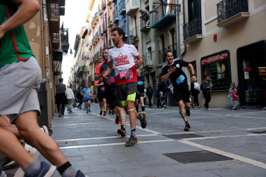 Fotos de la Tres Burgos Tres Millas celebrada este viernes en Pamplona.