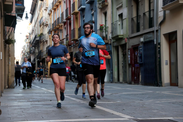 Fotos de la Tres Burgos Tres Millas celebrada este viernes en Pamplona.