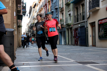 Fotos de la Tres Burgos Tres Millas celebrada este viernes en Pamplona.