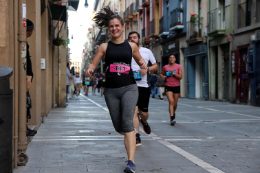 Fotos de la Tres Burgos Tres Millas celebrada este viernes en Pamplona.