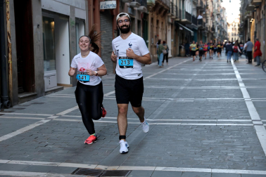 Fotos de la Tres Burgos Tres Millas celebrada este viernes en Pamplona.