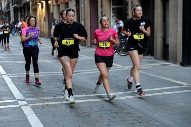 Fotos de la Tres Burgos Tres Millas celebrada este viernes en Pamplona.