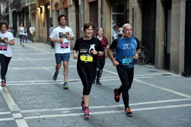 Fotos de la Tres Burgos Tres Millas celebrada este viernes en Pamplona.