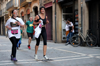 Fotos de la Tres Burgos Tres Millas celebrada este viernes en Pamplona.
