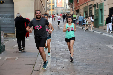 Fotos de la Tres Burgos Tres Millas celebrada este viernes en Pamplona.