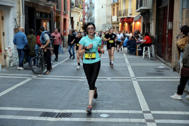 Fotos de la Tres Burgos Tres Millas celebrada este viernes en Pamplona.