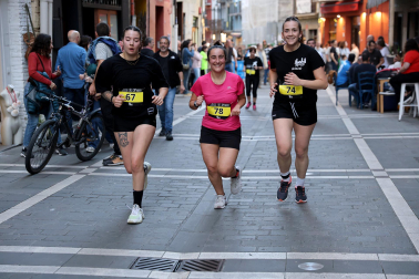 Fotos de la Tres Burgos Tres Millas celebrada este viernes en Pamplona.