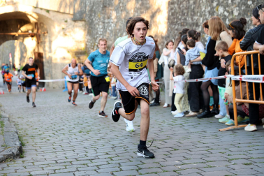 Fotos de la Tres Burgos Tres Millas celebrada este viernes en Pamplona.