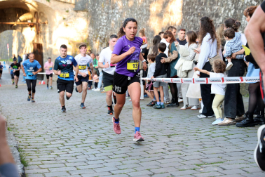 Fotos de la Tres Burgos Tres Millas celebrada este viernes en Pamplona.