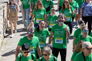 Fotos de la X Marcha contra el Cáncer en Pamplona.