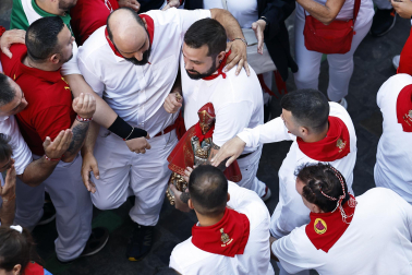 Fotos de los mozos en los minutos previos al comienzo del cuarto encierro de los Sanfermines 2024.