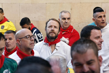 Fotos de los mozos en los minutos previos al comienzo del cuarto encierro de los Sanfermines 2024.