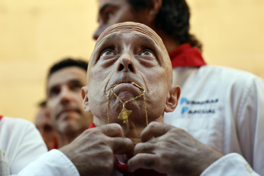 Fotos de los mozos en los minutos previos al comienzo del cuarto encierro de los Sanfermines 2024.