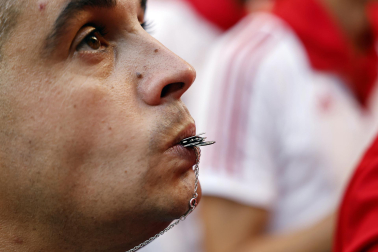 Fotos de los mozos en los minutos previos al comienzo del cuarto encierro de los Sanfermines 2024.