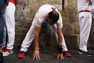 Fotos de los mozos en los minutos previos al comienzo del cuarto encierro de los Sanfermines 2024.