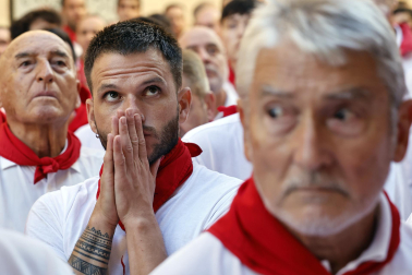 Fotos de los mozos en los minutos previos al comienzo del cuarto encierro de los Sanfermines 2024.