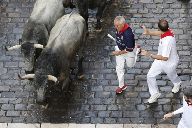 Fotos del sexto encierro de San Fermín con toros de Escolar. |