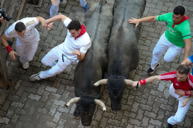 Fotos del sexto encierro de San Fermín 2025 en Pamplona. |