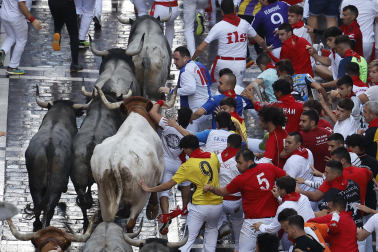 Fotos del sexto encierro de San Fermín 2025 en Pamplona. |