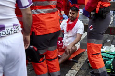 Fotos del sexto encierro de San Fermín con toros de Escolar. |