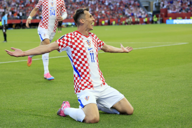Fotos del debut goleador de Budimir en el Mundial.