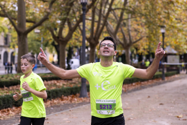 Participantes en la VII Carrera Popular Solidaria '+e' del Teléfono de la Esperanza de Navarra disputada en Pamplona /