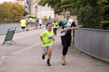 Participantes en la VII Carrera Popular Solidaria '+e' del Teléfono de la Esperanza de Navarra disputada en Pamplona /