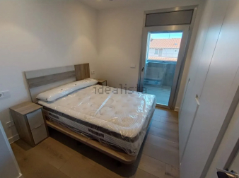 Dormitorio con acceso a la terraza
