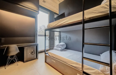 Literas en el segundo dormitorio de la vivienda