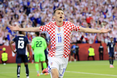 Fotos del debut goleador de Budimir en el Mundial.