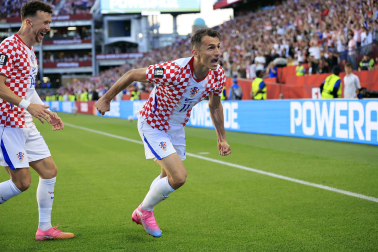 Fotos del debut goleador de Budimir en el Mundial.