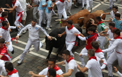 Fotos del cuarto encierro de San Fermín 2026 en Pamplona